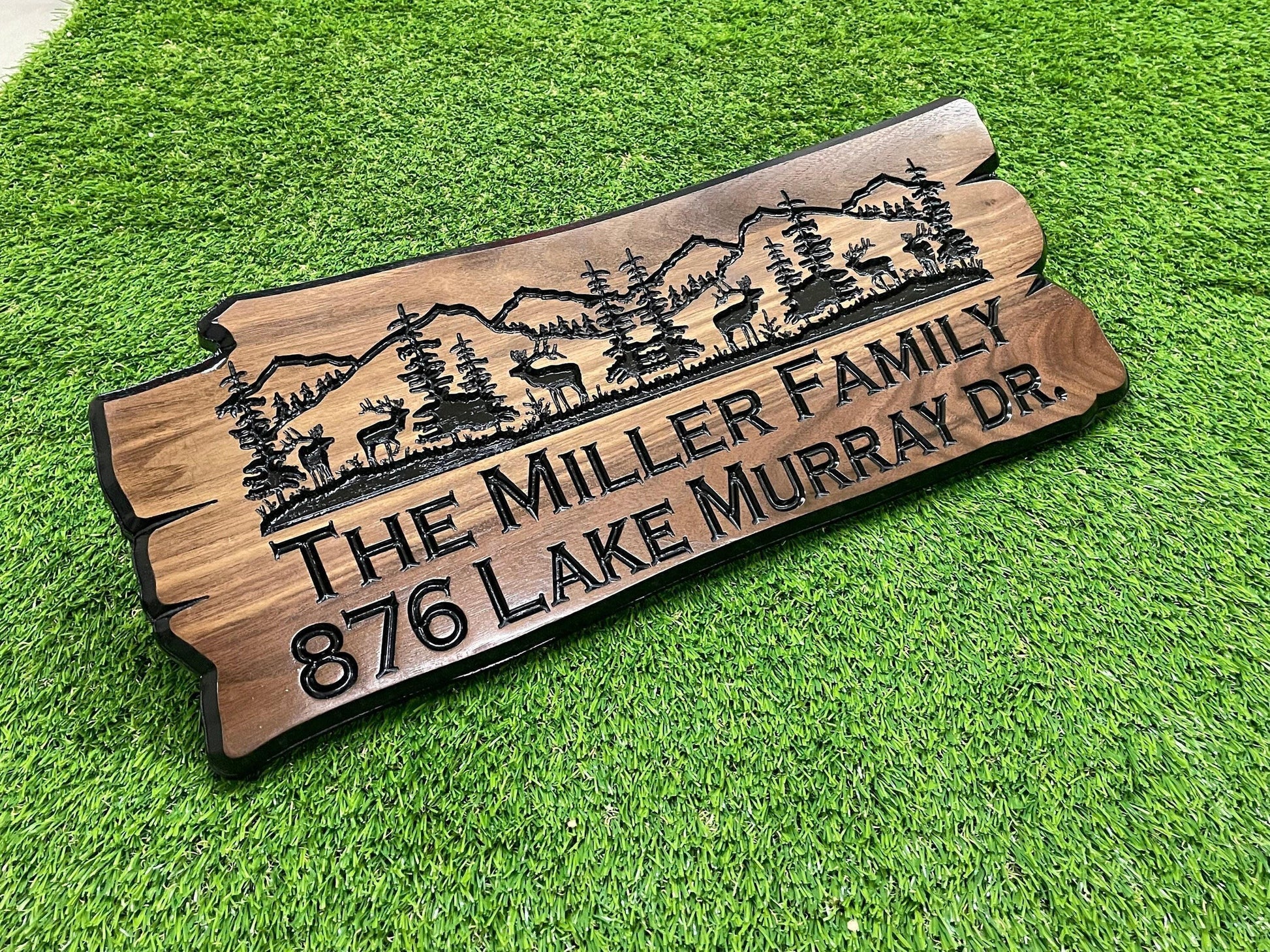 a wooden sign that says the miller family