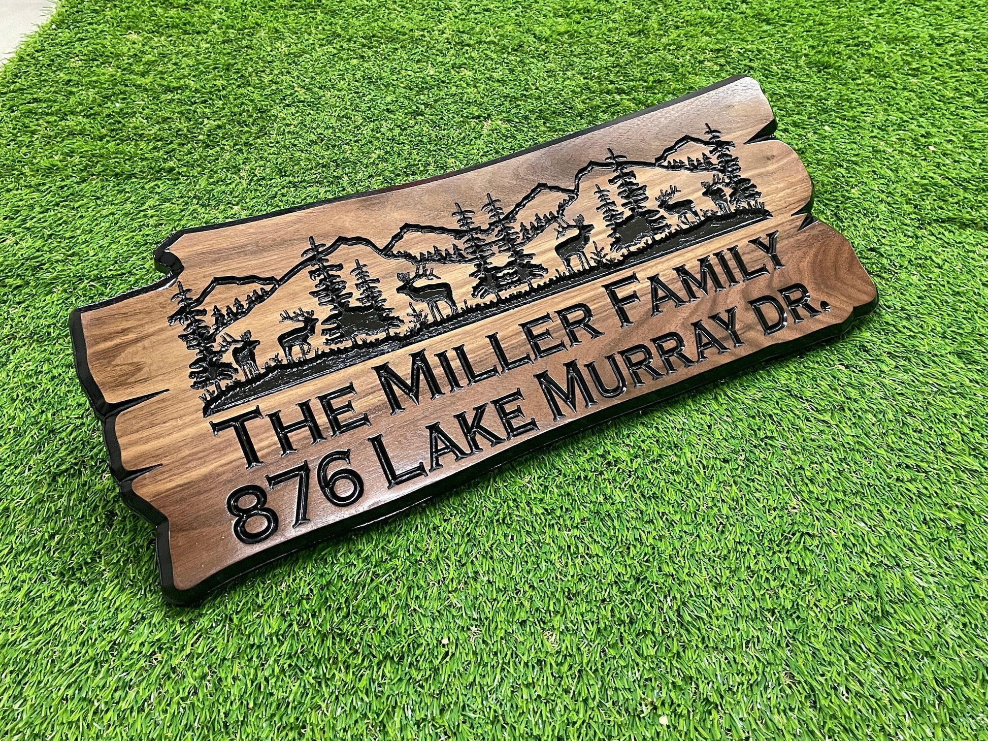 a wooden sign that says the miller family