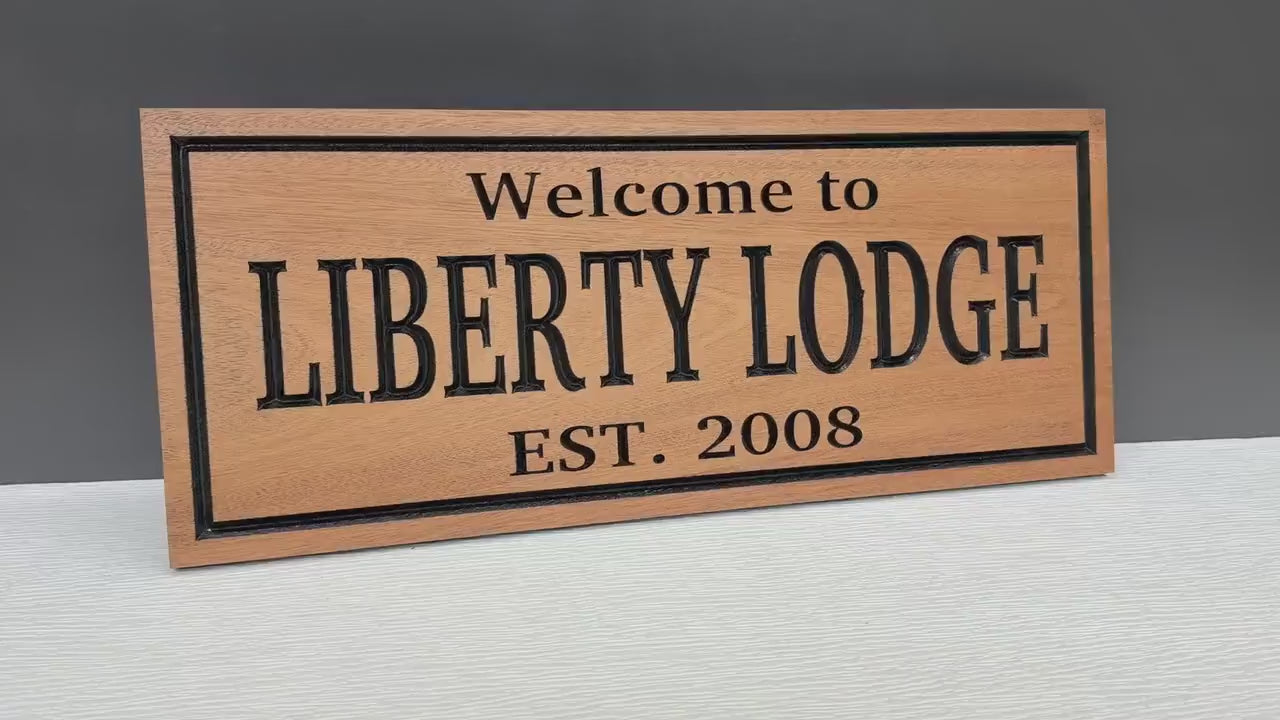 Load video: Fishing Lodge Sign Custom Wood, Corporate Retreat Decor, Personalized Hunting Retreat Sign, Camp Welcome Sign Carved
