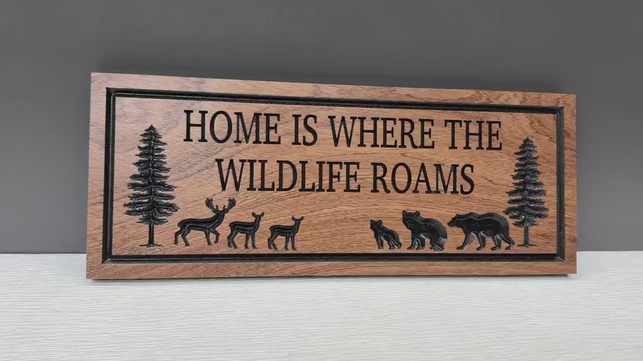 Load video: Home Is Where the Wildlife Roams Sign Custom Wood, Bear Deer Pine Tree Cabin Decor, Wildlife Family Sign Carved Hardwood, Nature Lodge Sign