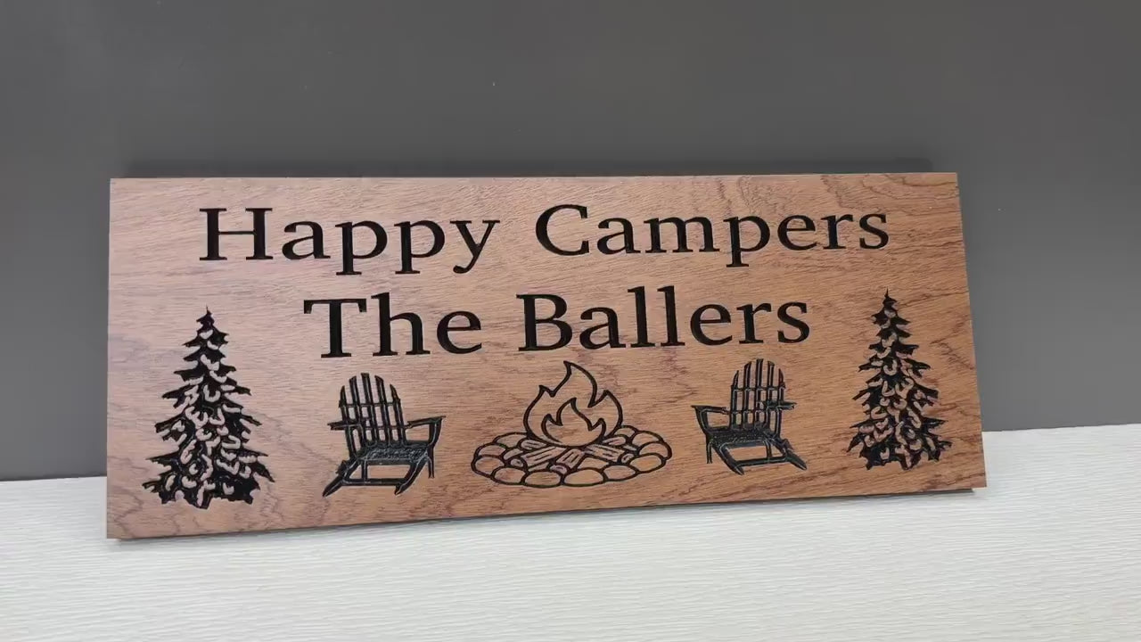 Load video: Happy Campers Sign Custom Wood, Personalized Family Name Camp Sign, Adirondack Chair Campfire Pine Tree Carved, Cabin Campsite Decor
