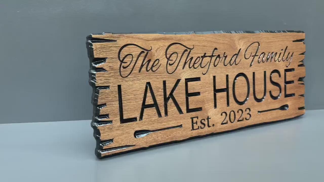 Load video: Lake House Sign Custom Wood Live Edge, Family Name Lake House Sign Paddle Carved, Established Date Lake Sign Hardwood Personalized