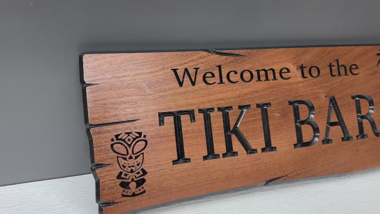 Load video: Custom Tiki Bar Decor - Carved Wooden Tribal Wall Art with Palm Trees &amp; Hibiscus, Hawaiian-Inspired Tropical Accent for Home and Patio Art